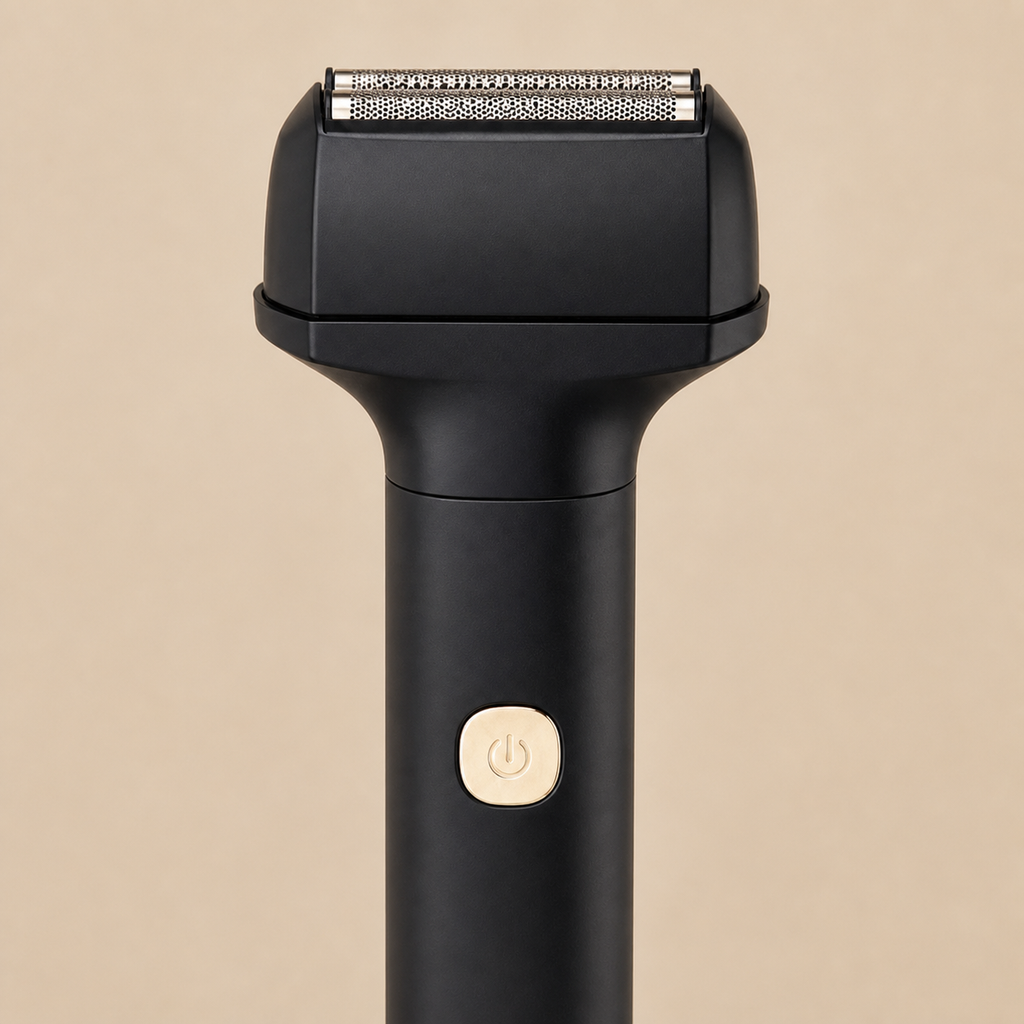 Black cordless foil shaver — power button detail