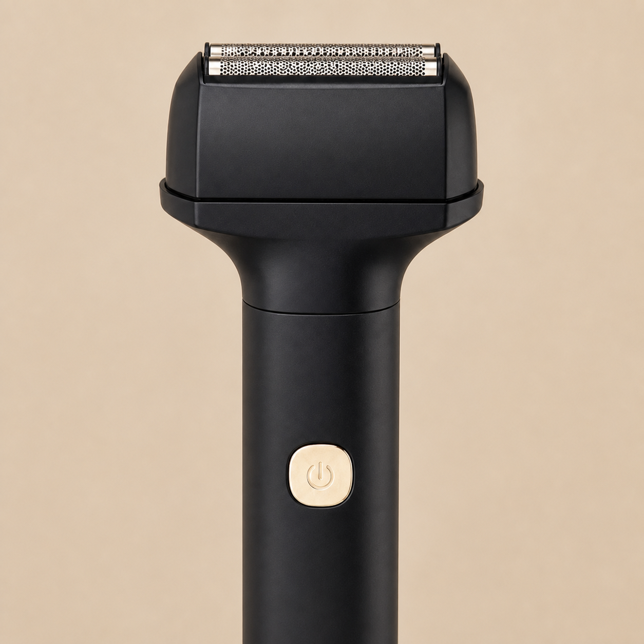 Black cordless foil shaver — power button detail
