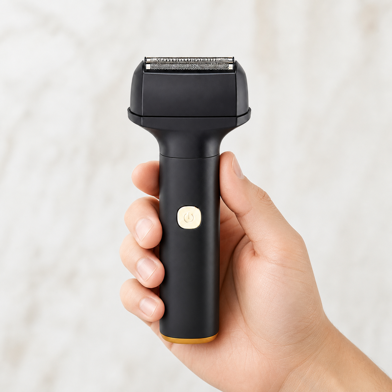 Black cordless foil shaver — handheld cordless-use view